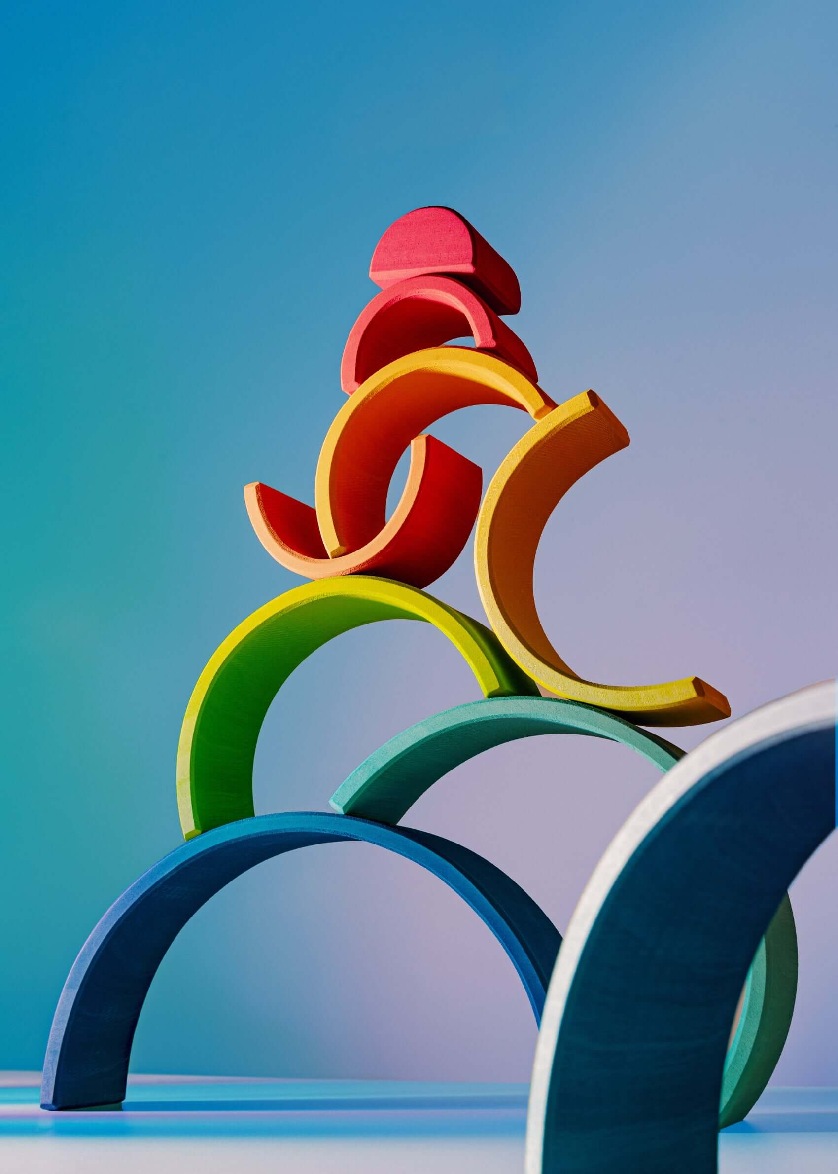 Large Wooden Rainbow stacked in vibrant colors, perfect for open-ended play and Montessori-inspired learning.