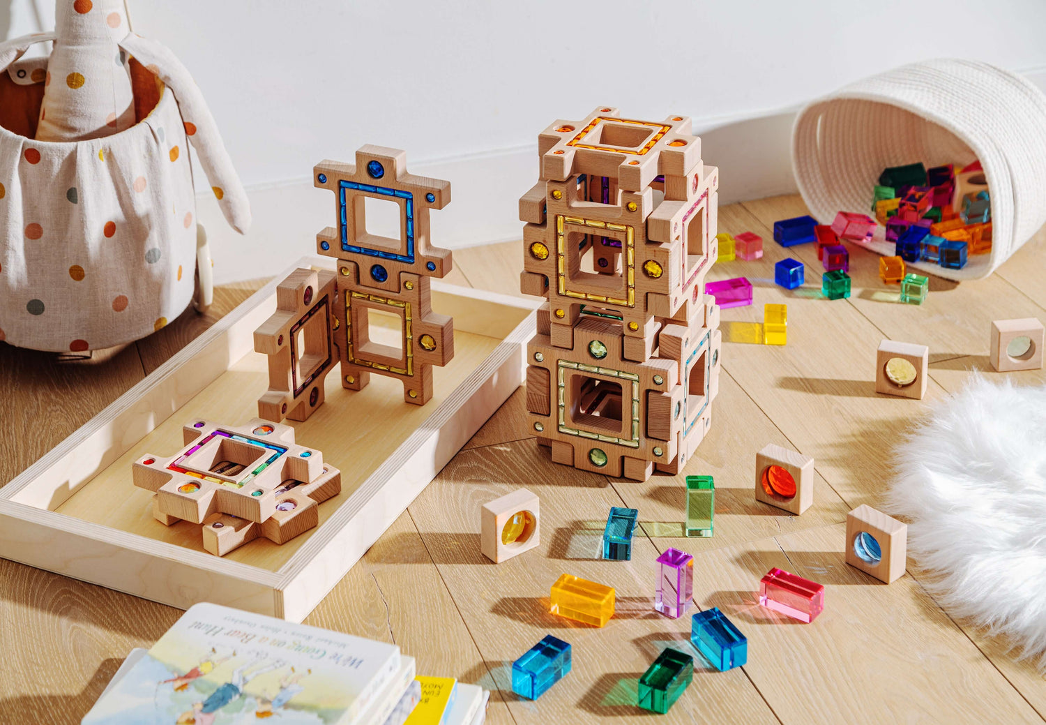 Busy Blocks eco-conscious wooden blocks with gem-like inlays, interlocking shapes and colorful tiles for open-ended building play