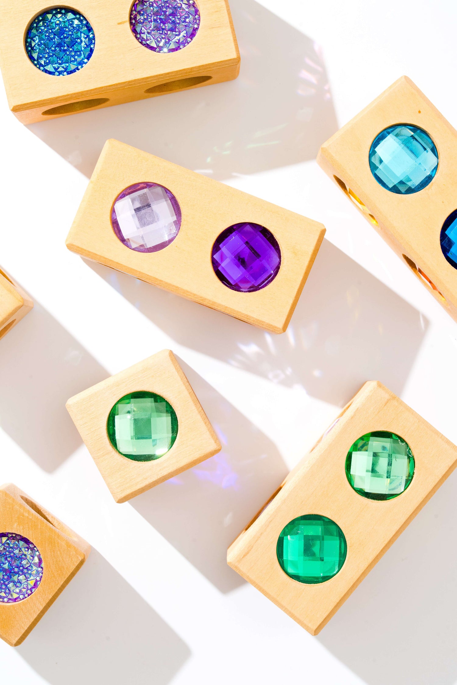 Frankie blocks wooden sensory blocks with colorful gem inserts reflecting light, open-ended stacking and building toy