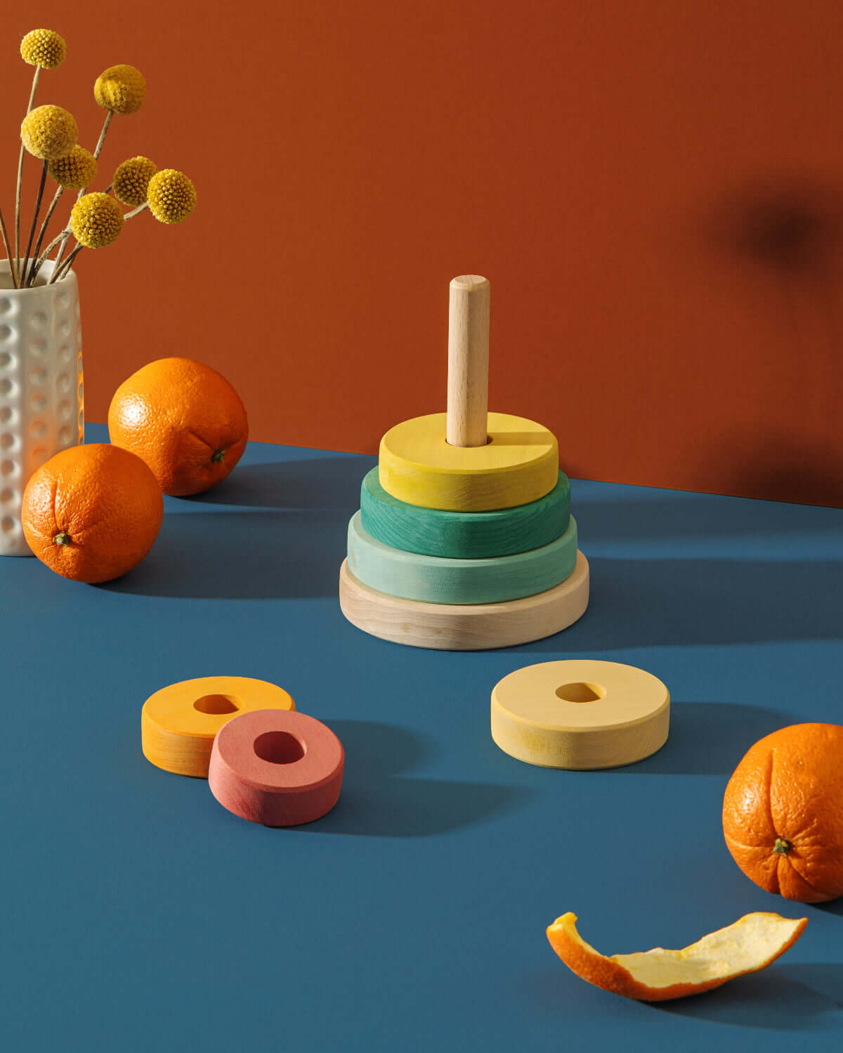 Suki Stacking Tower wooden toddler stacking toy with pastel rings, durable child-safe design for fine motor skills