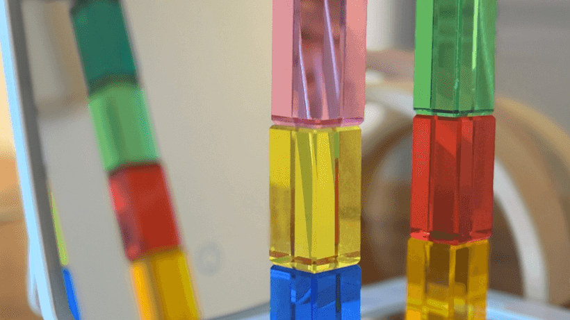 Exploring Reflections and Symmetry with Lucite Cubes