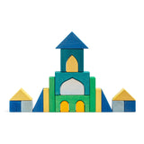 Alex Building Blocks wooden set arranged as colorful castle with arches, towers and geometric shapes, non-toxic lime wood