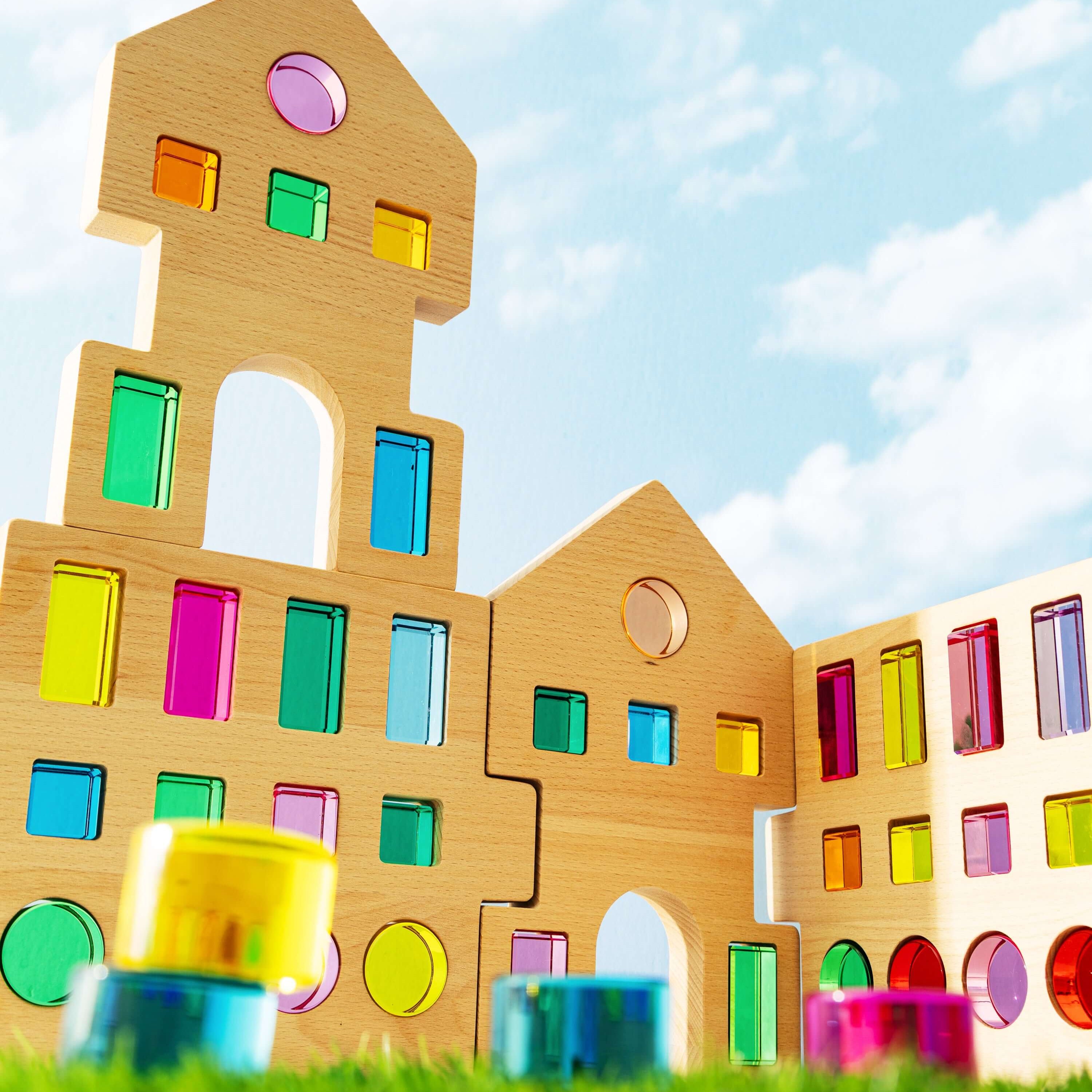 Rêve House Set modular wooden building set with colorful panels and vibrant architectural design.