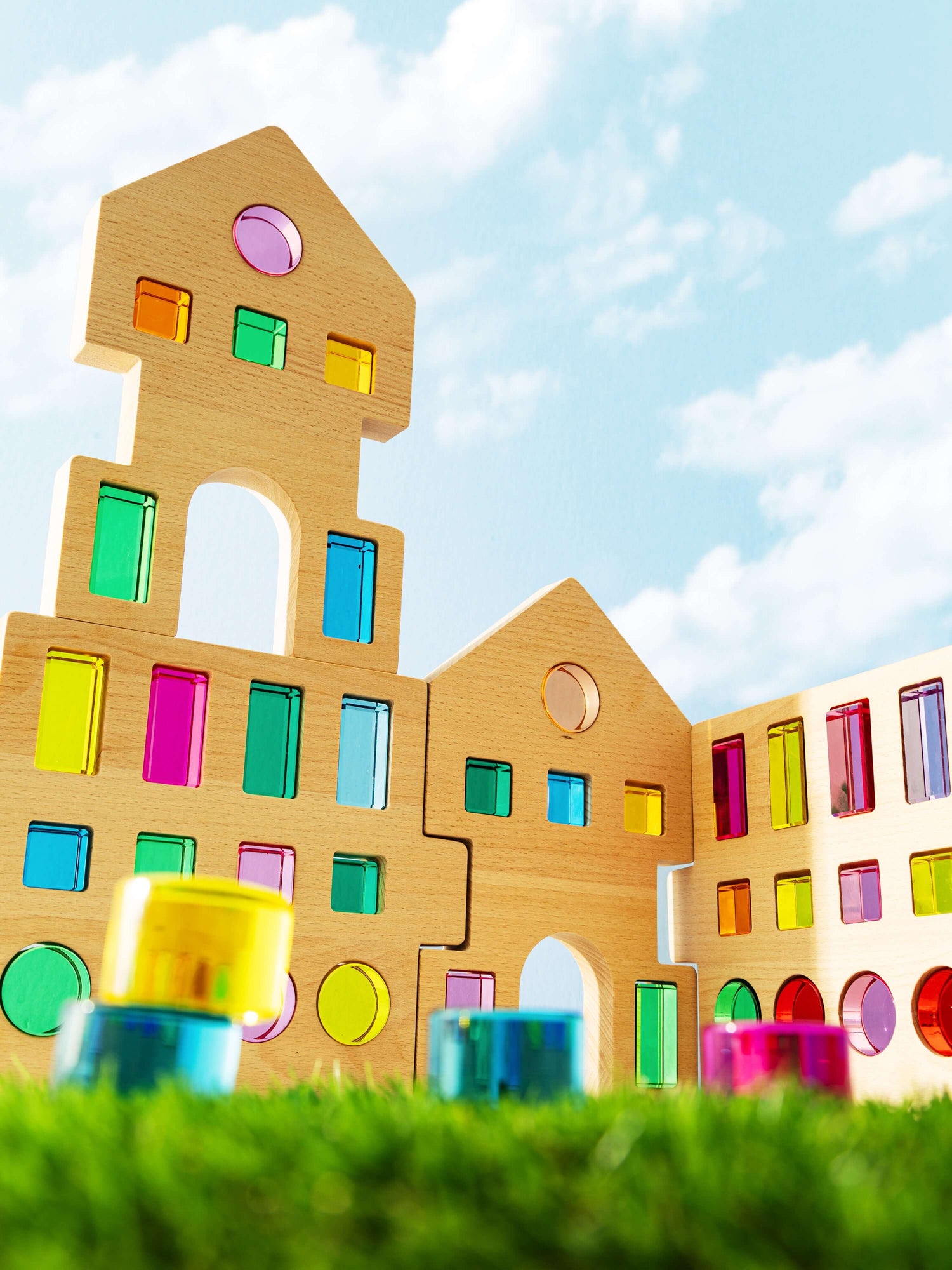 Rêve House Set modular wooden building set with colorful panels and vibrant architectural design.