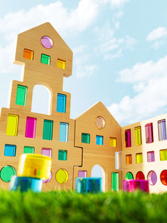 Rêve House Set modular wooden building set with colorful panels and vibrant architectural design.