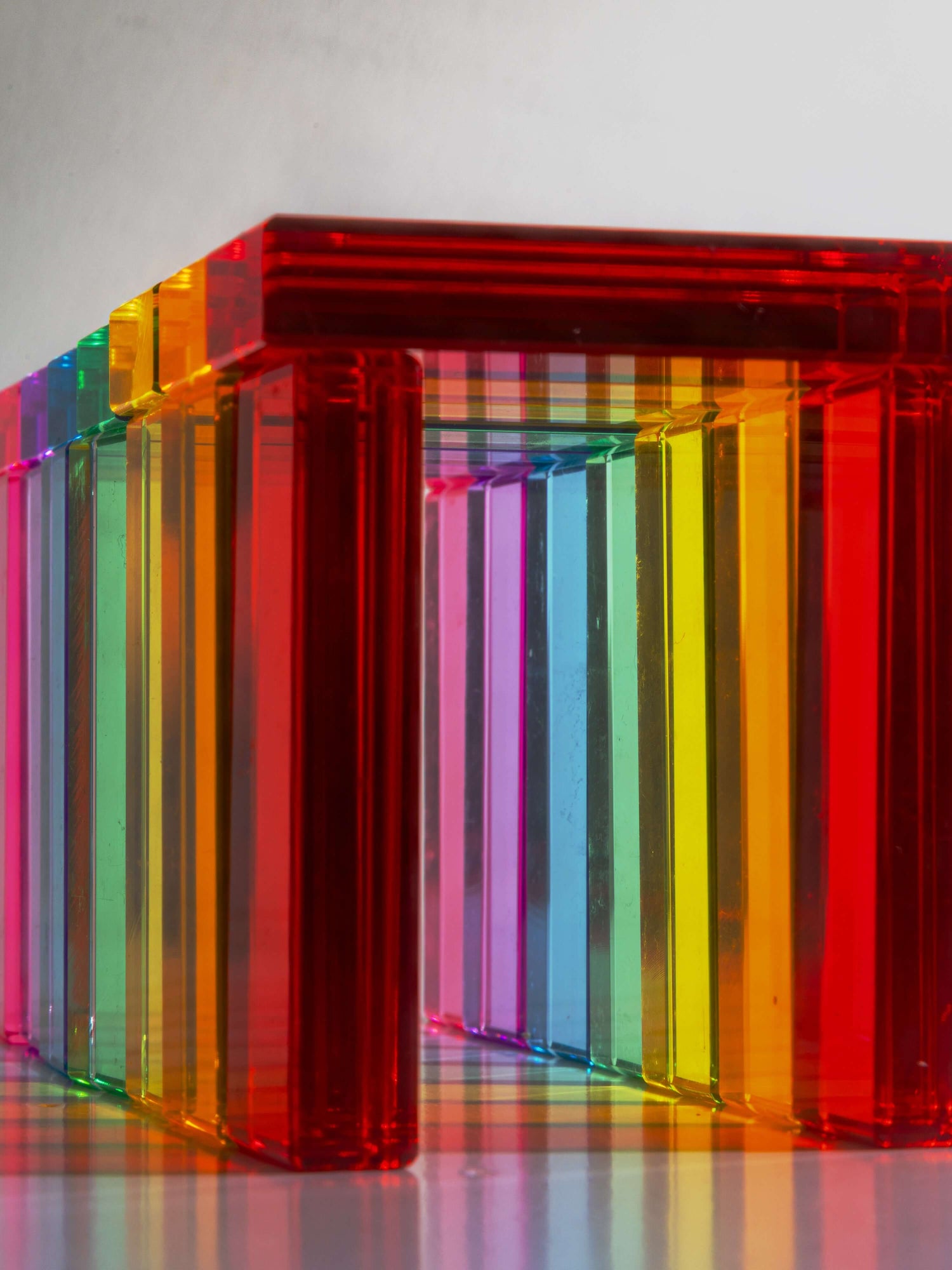 Illume Tower acrylic stacking blocks showcasing vibrant colors and translucent design for creative play.
