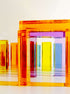Illume Tower acrylic stacking blocks showcased in a vibrant arrangement of translucent colors.