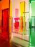 Colorful Illume Tower acrylic stacking blocks in various shapes creating a dynamic play environment.