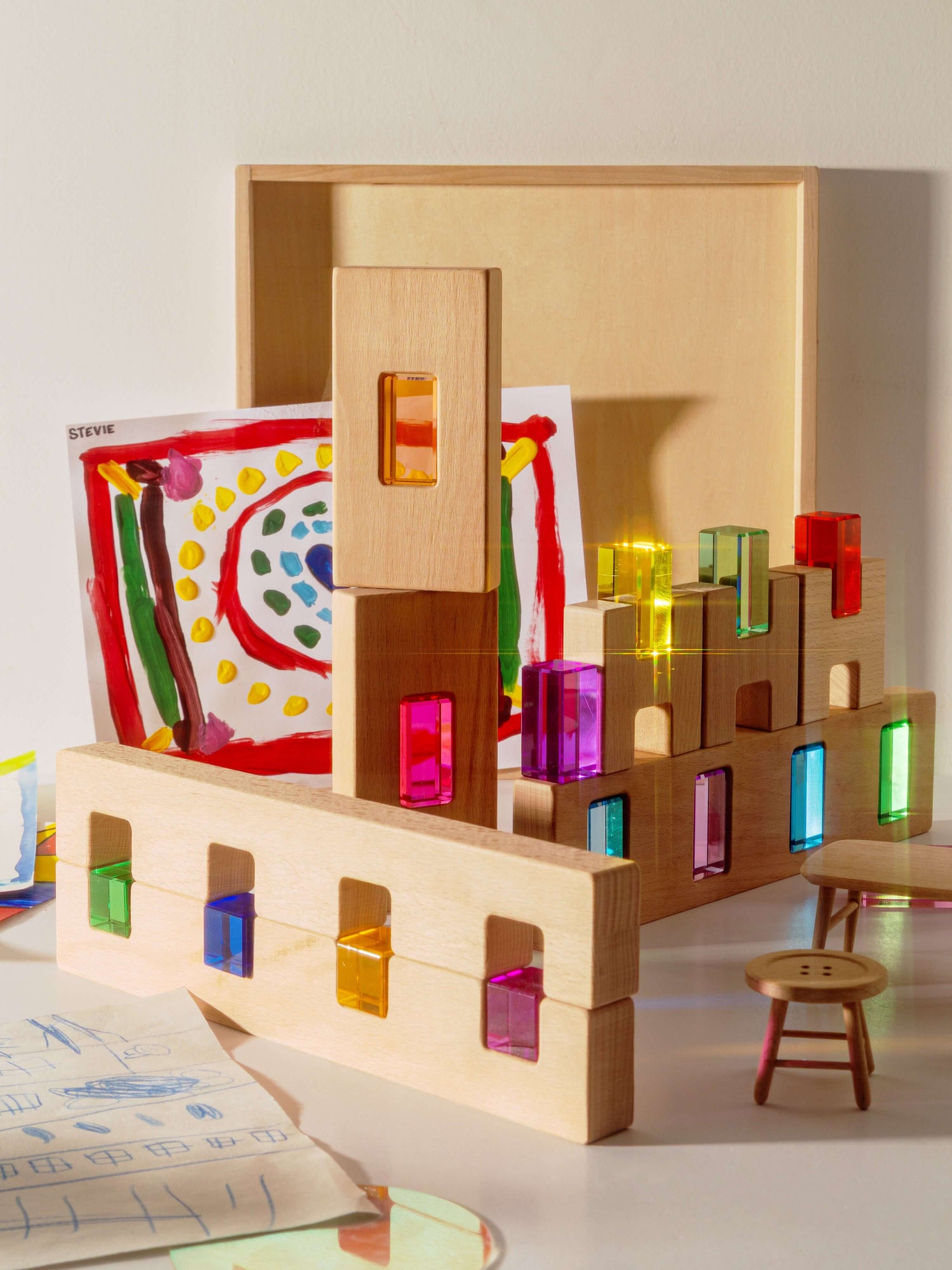Fynn Set wooden building panels with colorful acrylic window inserts for creative play.