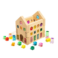 Rêve House Set modular wooden building set displayed with colorful geometric blocks around it.