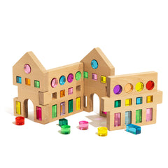 Colorful Rêve House Set modular wooden building set with transparent panels for creative play.