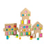 Rêve House Set modular wooden building set with colorful translucent windows and geometric shapes.