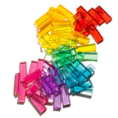 Illume Tower acrylic stacking blocks in vibrant rainbow colors, showcasing translucent acrylic pieces for creative play.