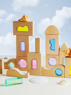 Laguna Block Set showcasing natural beechwood and colorful acrylic pieces against a sky backdrop.