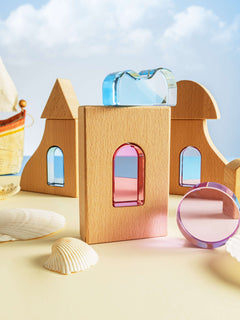 Laguna Block Set showcasing colorful acrylic pieces amidst natural beechwood structures.