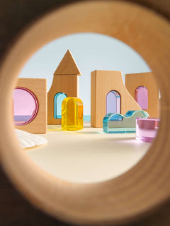 Laguna Block Set featuring colorful acrylic and beechwood pieces for imaginative play.