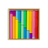 Colorful geometric shapes in a wooden frame on a white background