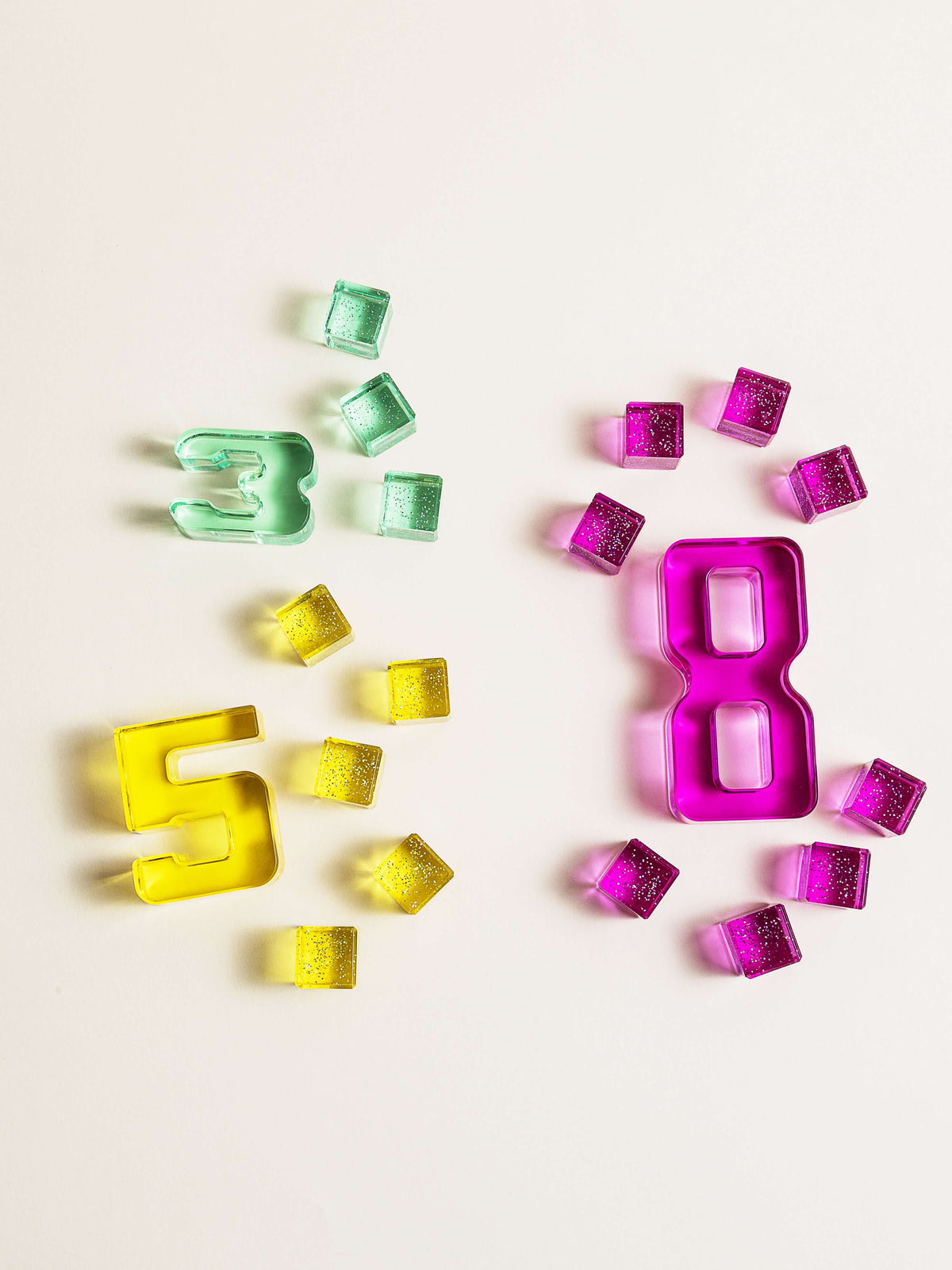 Colorful Number Blocks featuring numbers 3, 5, and 8 in vibrant acrylic designs for early math learning.