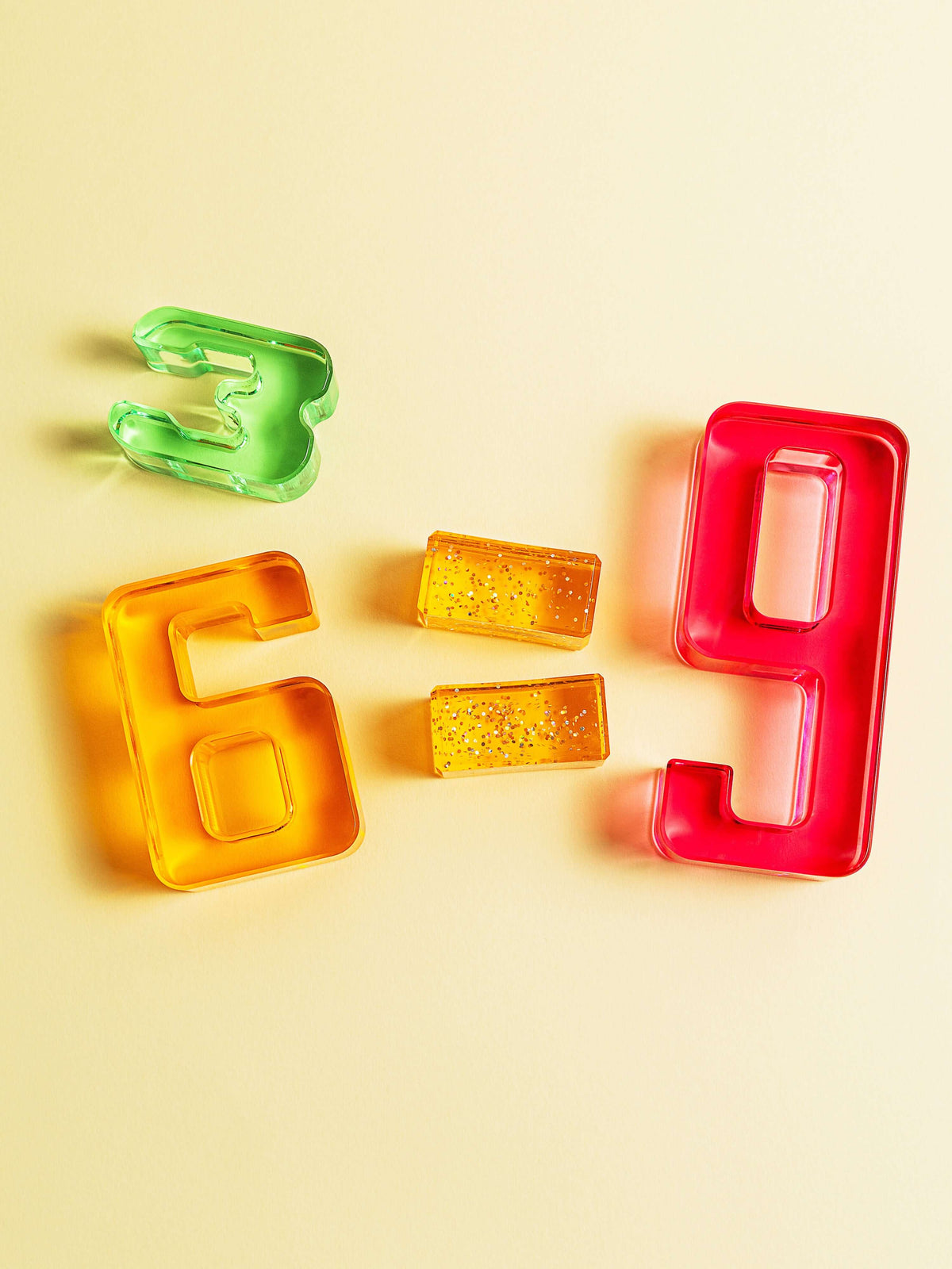 Colorful acrylic Number Blocks featuring numbers 3, 6, and 9 demonstrating mathematical relationships.