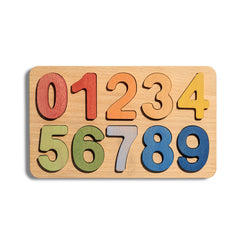 A wooden number puzzle board featuring colorful cutout numbers from 0 to 9 on a light natural wood background, shown against a plain white backdrop.
