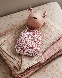 Pocket Pals organic cotton squirrel lovey comforter with fern print pouch, soft baby comfort toy on folded blanket