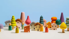 Bergen Building Blocks wooden city set with pastel trees, colorful houses and wooden friends for imaginative play ages 3+