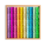 Maison Rue Veda Blocks 50-piece translucent glitter acrylic building block set in rainbow colors with wooden storage tray.