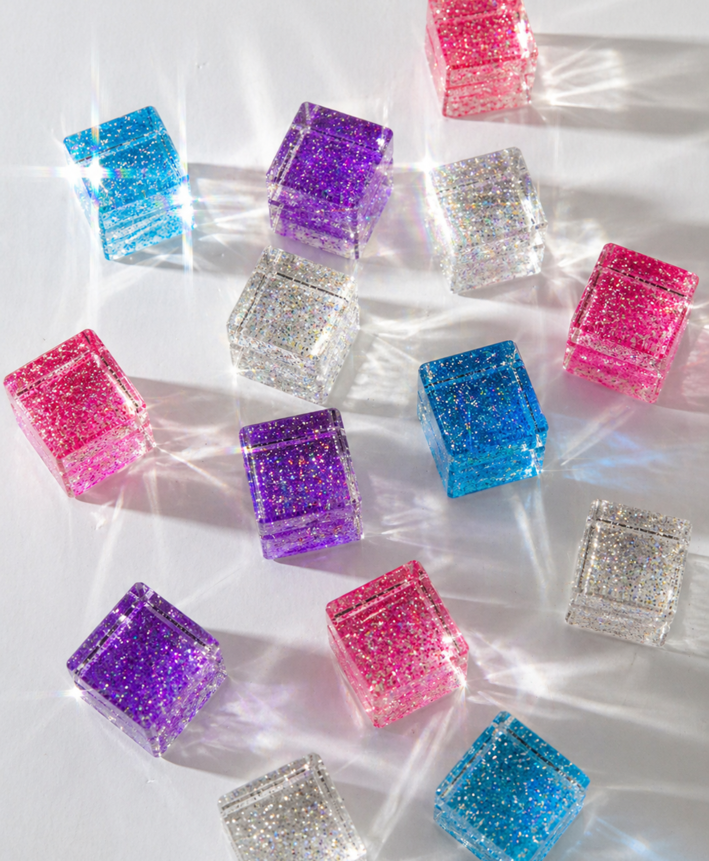 Colorful sparkling blocks from the luminous play set for creative kids, showcasing light and color.