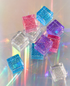 Colorful glitter cubes showcasing the luminous play set for creative kids.