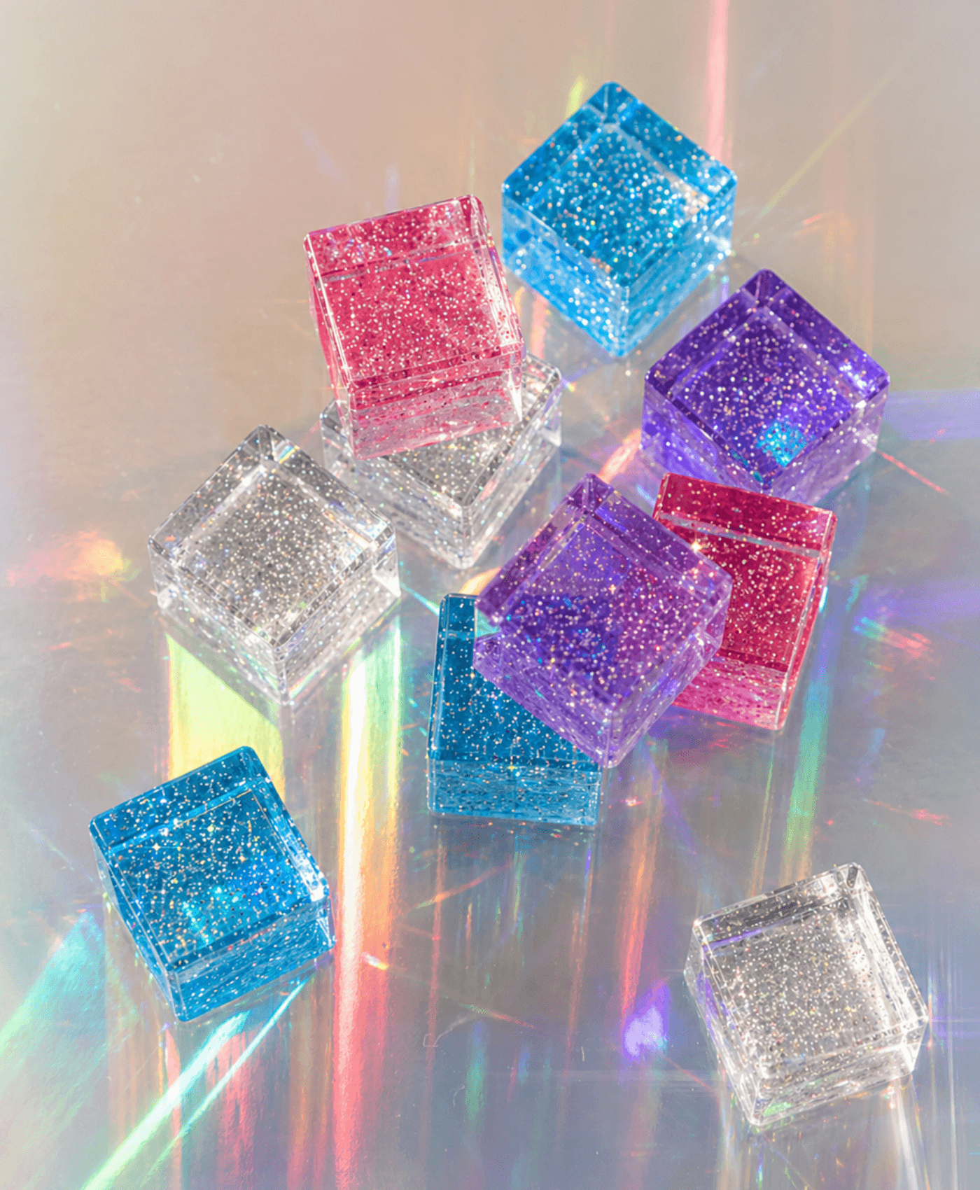 Colorful glitter cubes showcasing the luminous play set for creative kids.