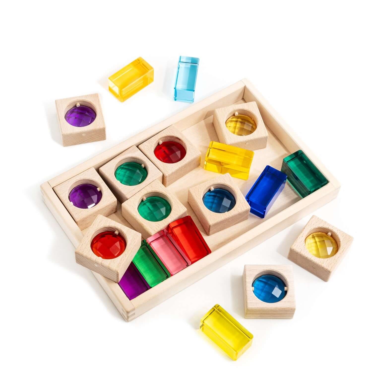 Alt Tag: James Blocks Digital Play Guide with wooden blocks and colorful translucent pieces for open-ended imaginative learning