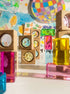 james blocks pastel translucent wooden blocks casting colored shadows in sunlight