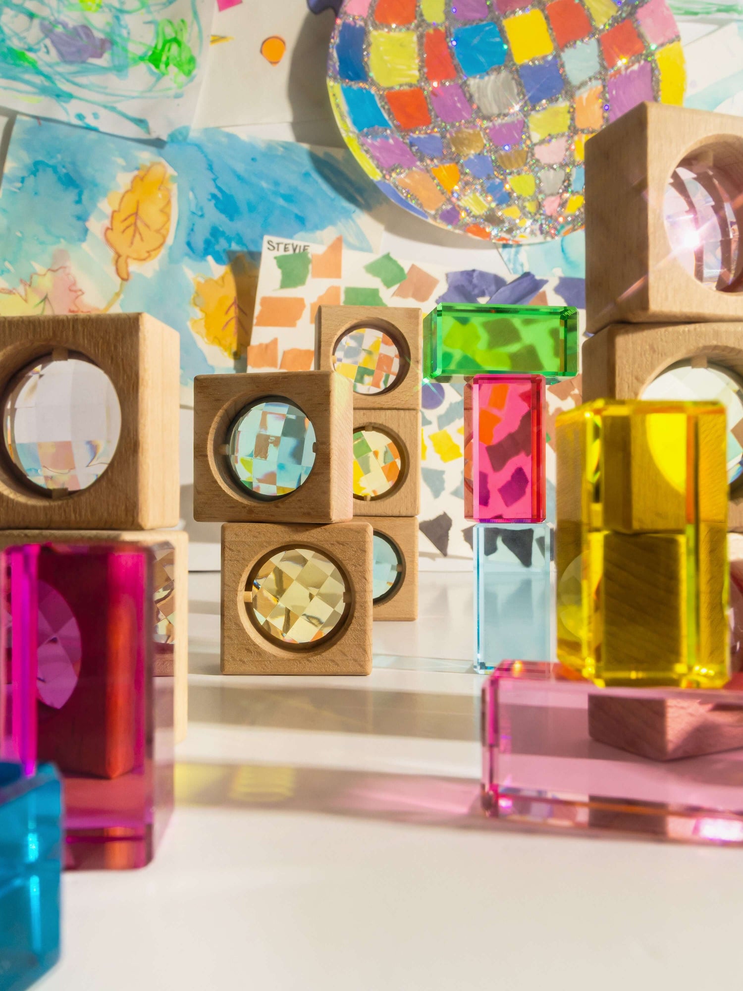 james blocks pastel translucent wooden blocks casting colored shadows in sunlight