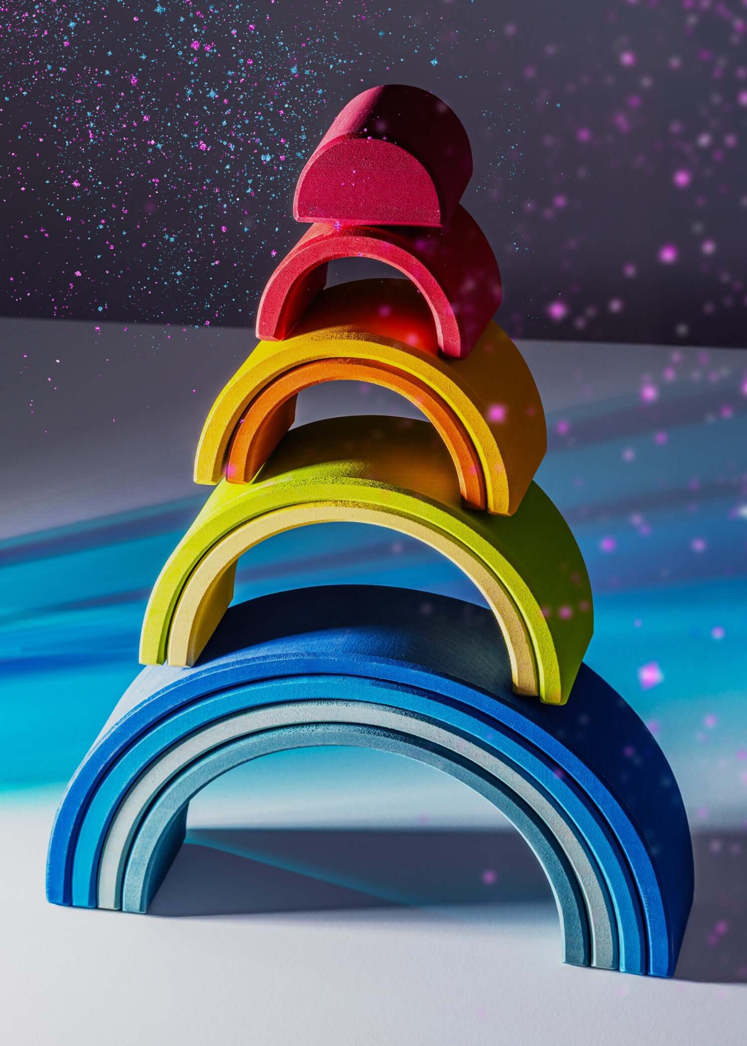 Colorful Large Wooden Rainbow stacking toy showcasing bold arches in vibrant hues.