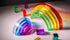 Lucid Rainbow acrylic stacking toy featuring vibrant translucent arches and colorful blocks.