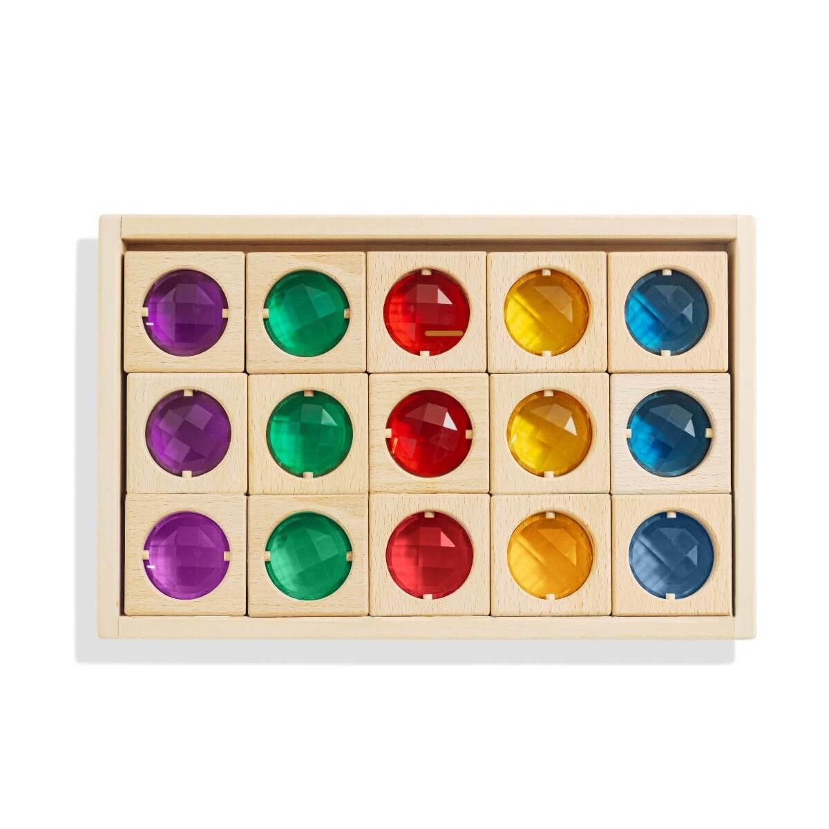 Lyla Blocks handcrafted wooden gem blocks with colorful inset acrylic gems in a tray for sensory play and color recognition