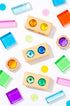 Theo Blocks crystal-clear acrylic square blocks and colorful light discs for open-ended stacking, sorting, and color play