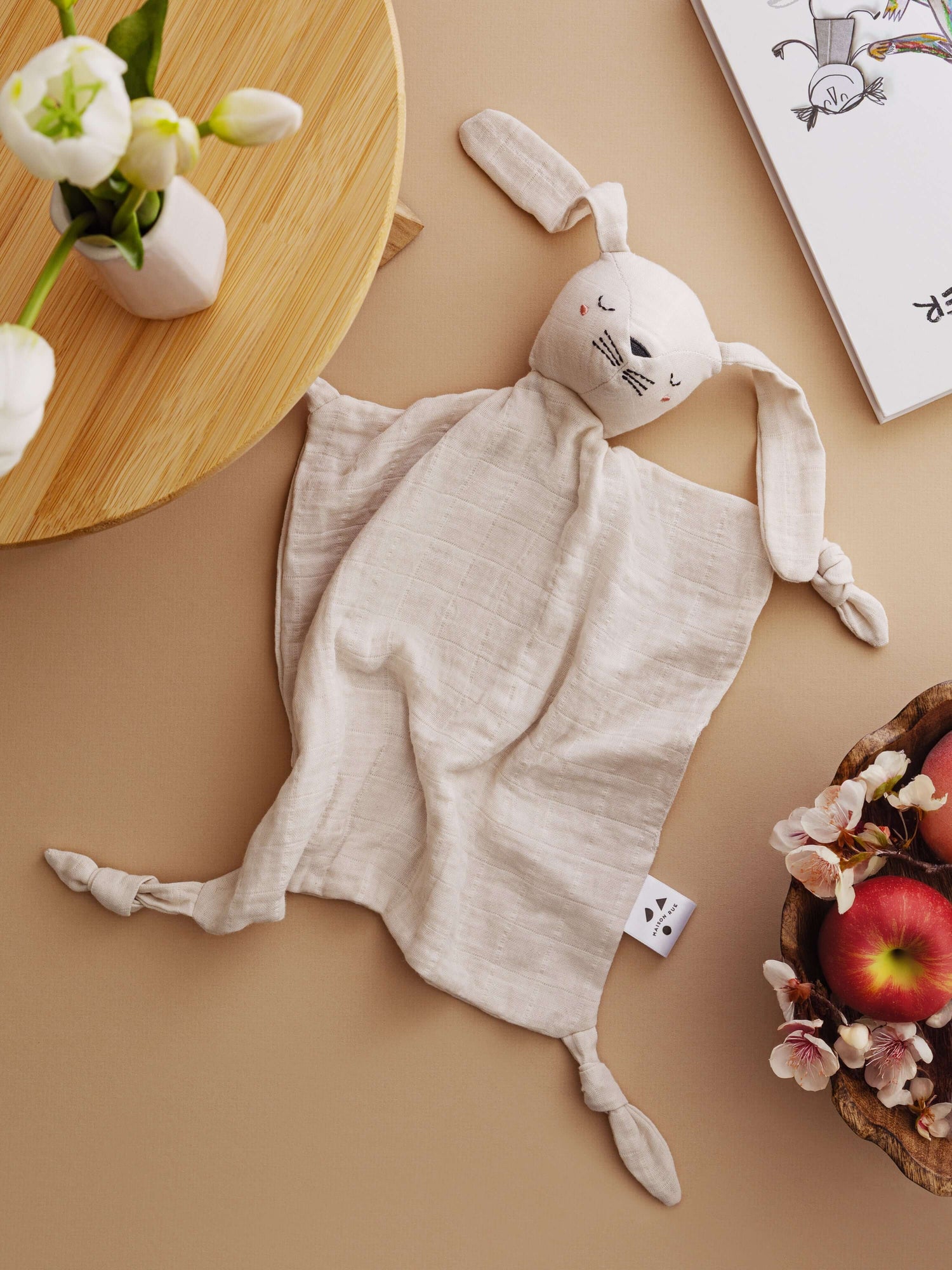 Soft Pocket Pals bunny comforter with floppy ears, perfect for comforting babies during adventures.
