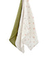Pomme Burp Cloths featuring three organic cotton muslin cloths in green, white, and floral patterns.