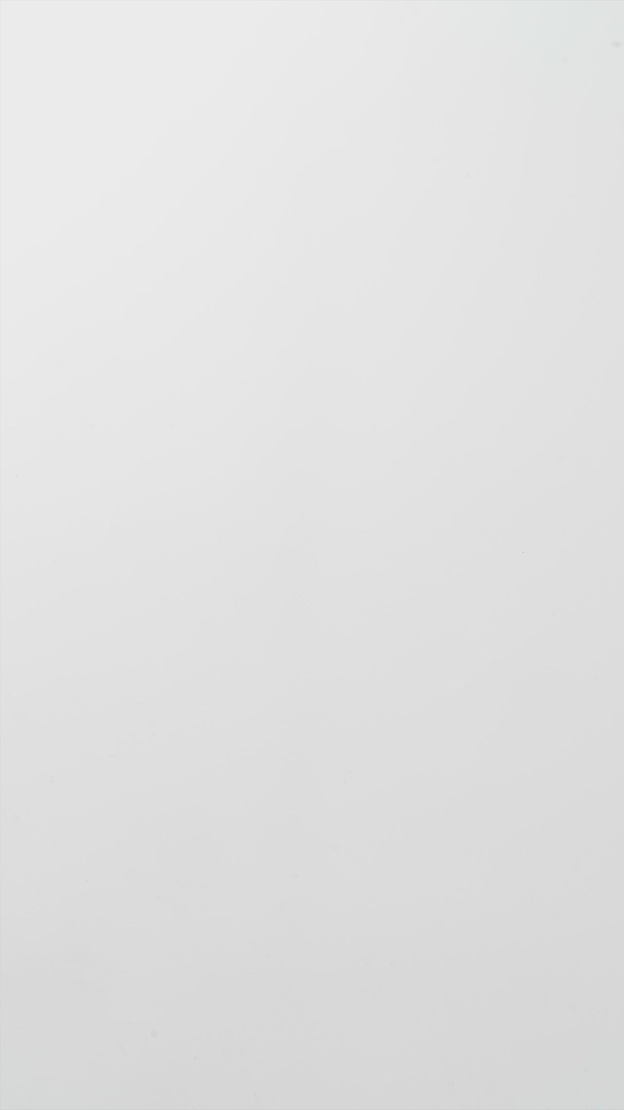 Acrylic rainbow and wooden cubes showing colorful reflections on white background