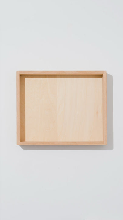 Acrylic rainbow and wooden blocks on white background