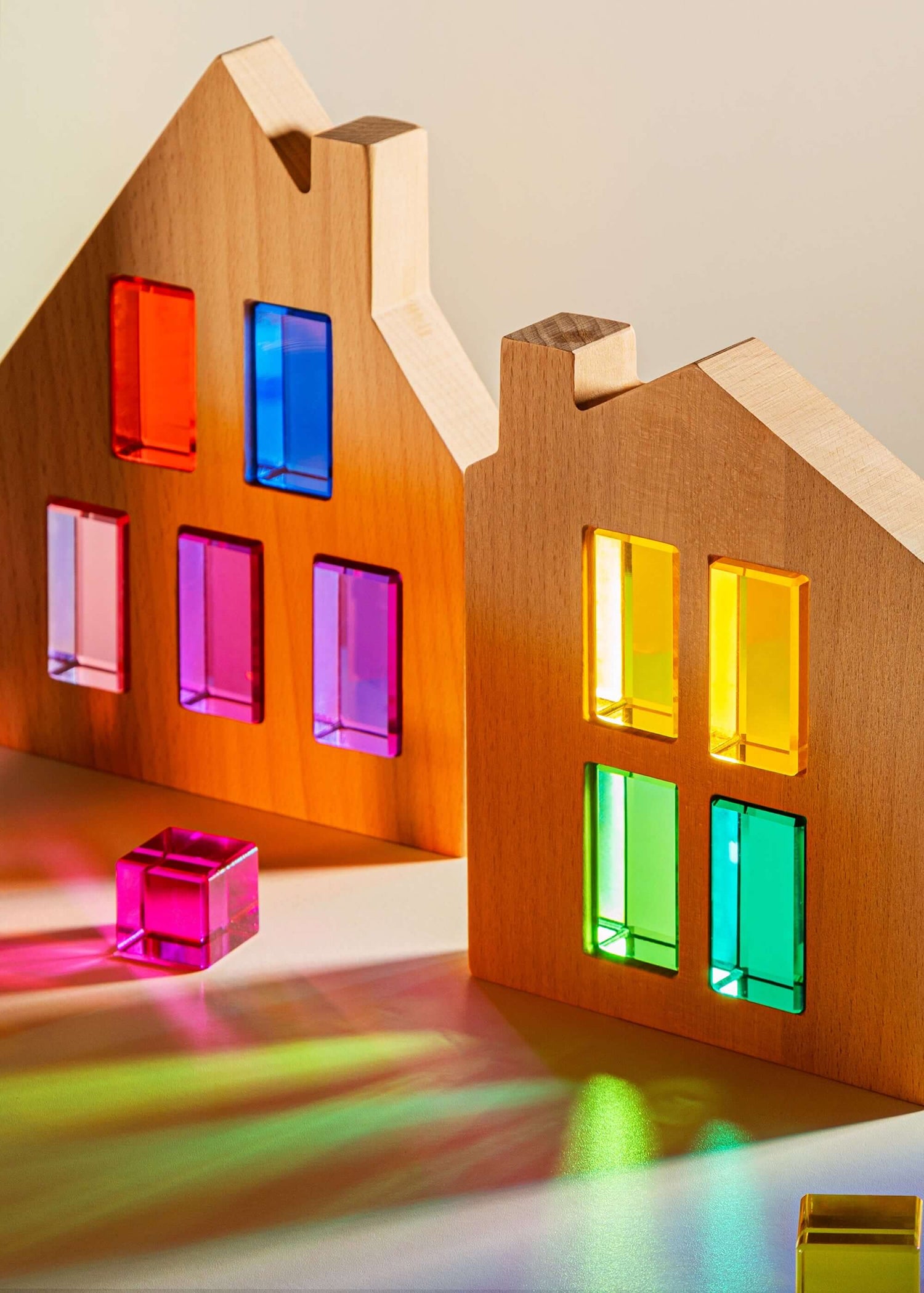 wooden window blocks reflecting colorful light