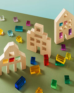 close up of riley wooden city blocks with acrylic gems