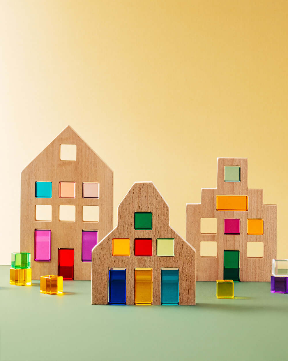 Alt Tag: Riley Blocks Digital Play Guide featuring colorful wooden building houses and translucent blocks for creative learning play