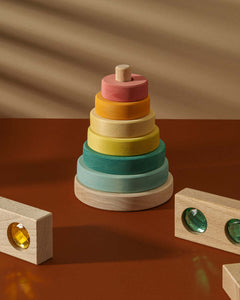 Suki Stacking Tower wooden rainbow ring stacker toy in soft pastel colors for toddlers, fine motor skill development